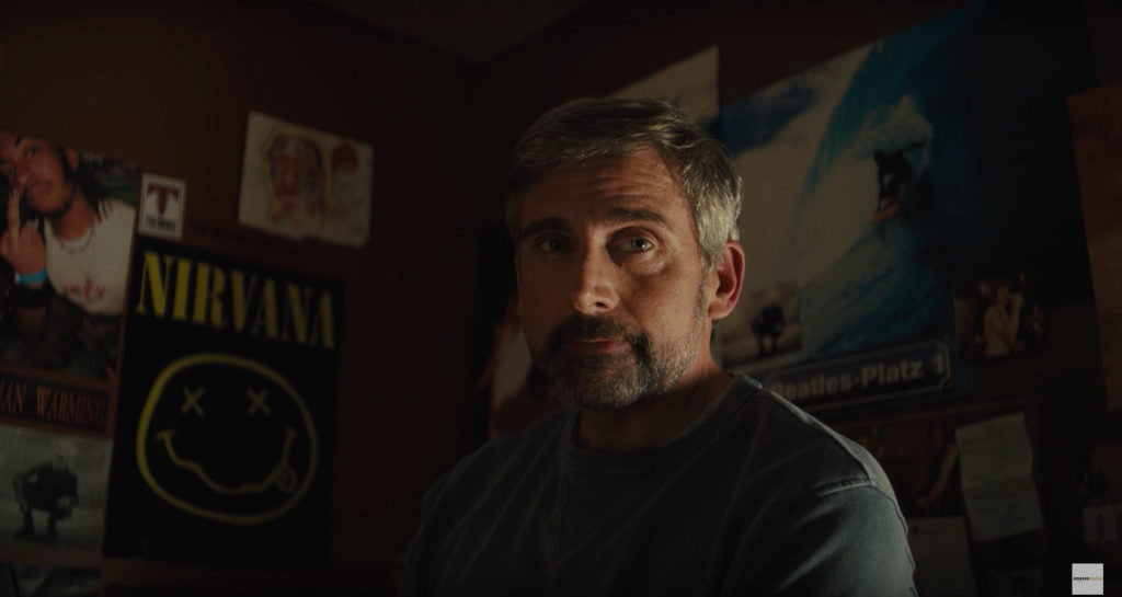 Steve Carell sitting in a room