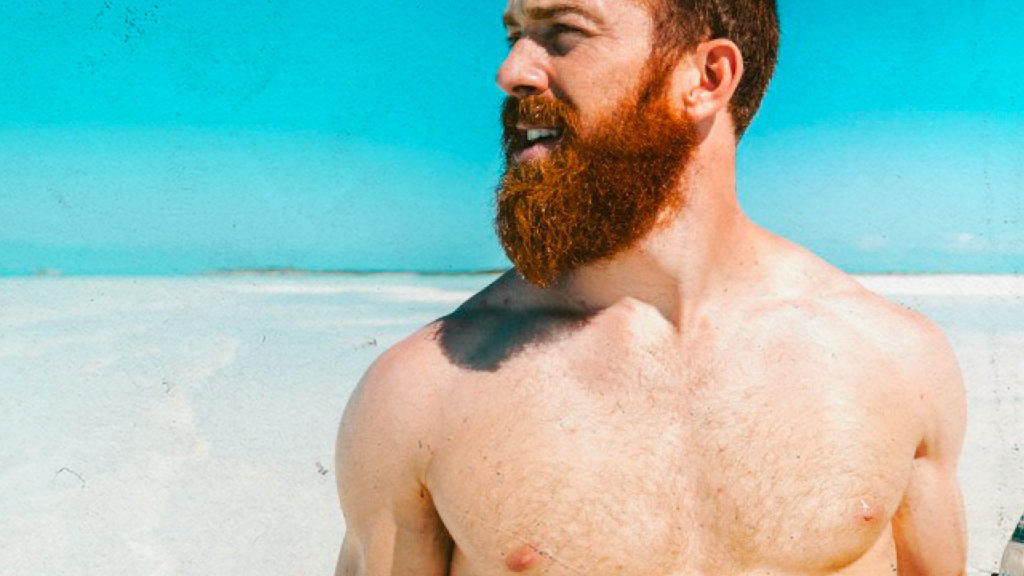 bearded man by the beach